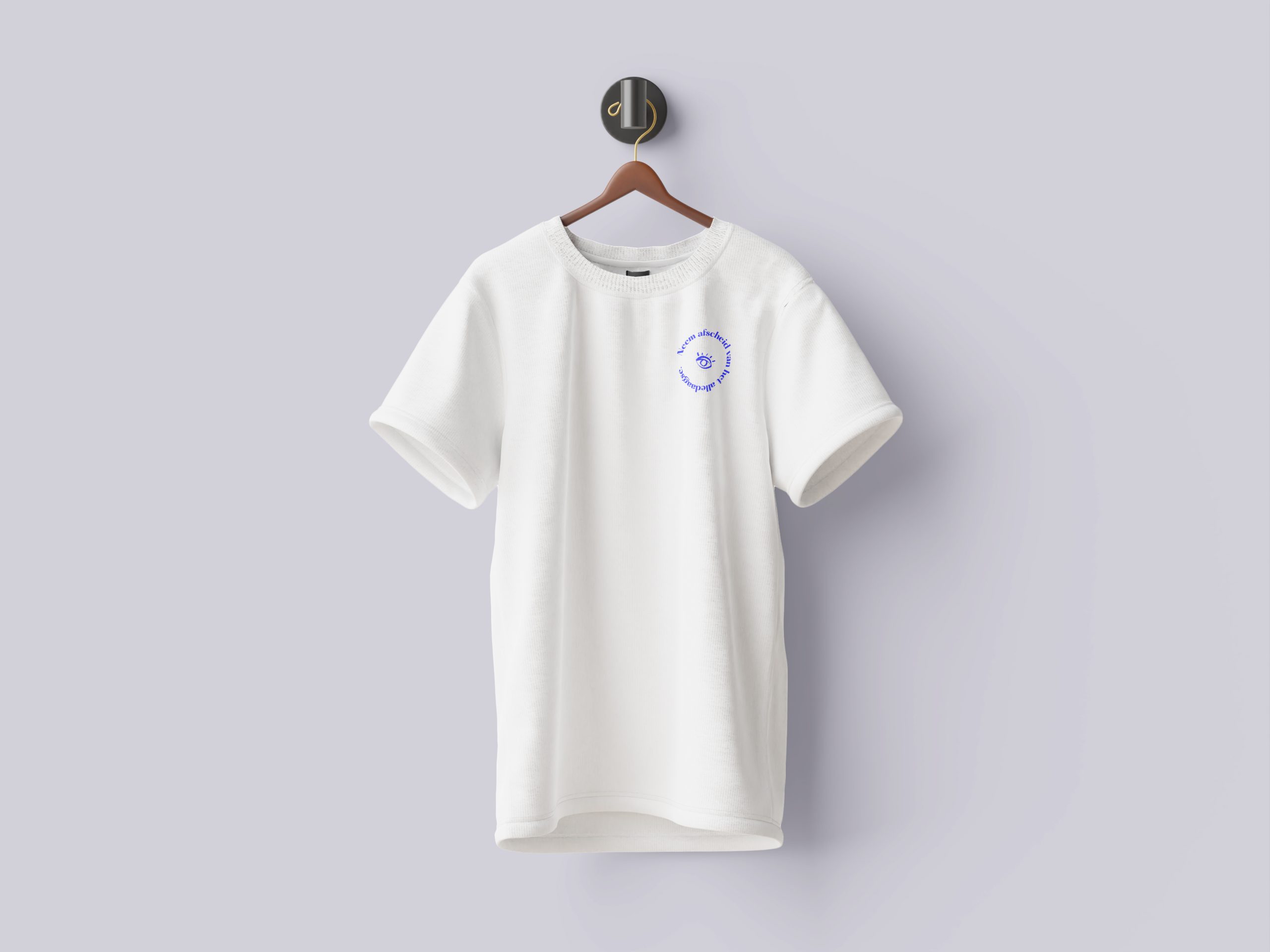 01. T shirt on Wall Mockup1 scaled